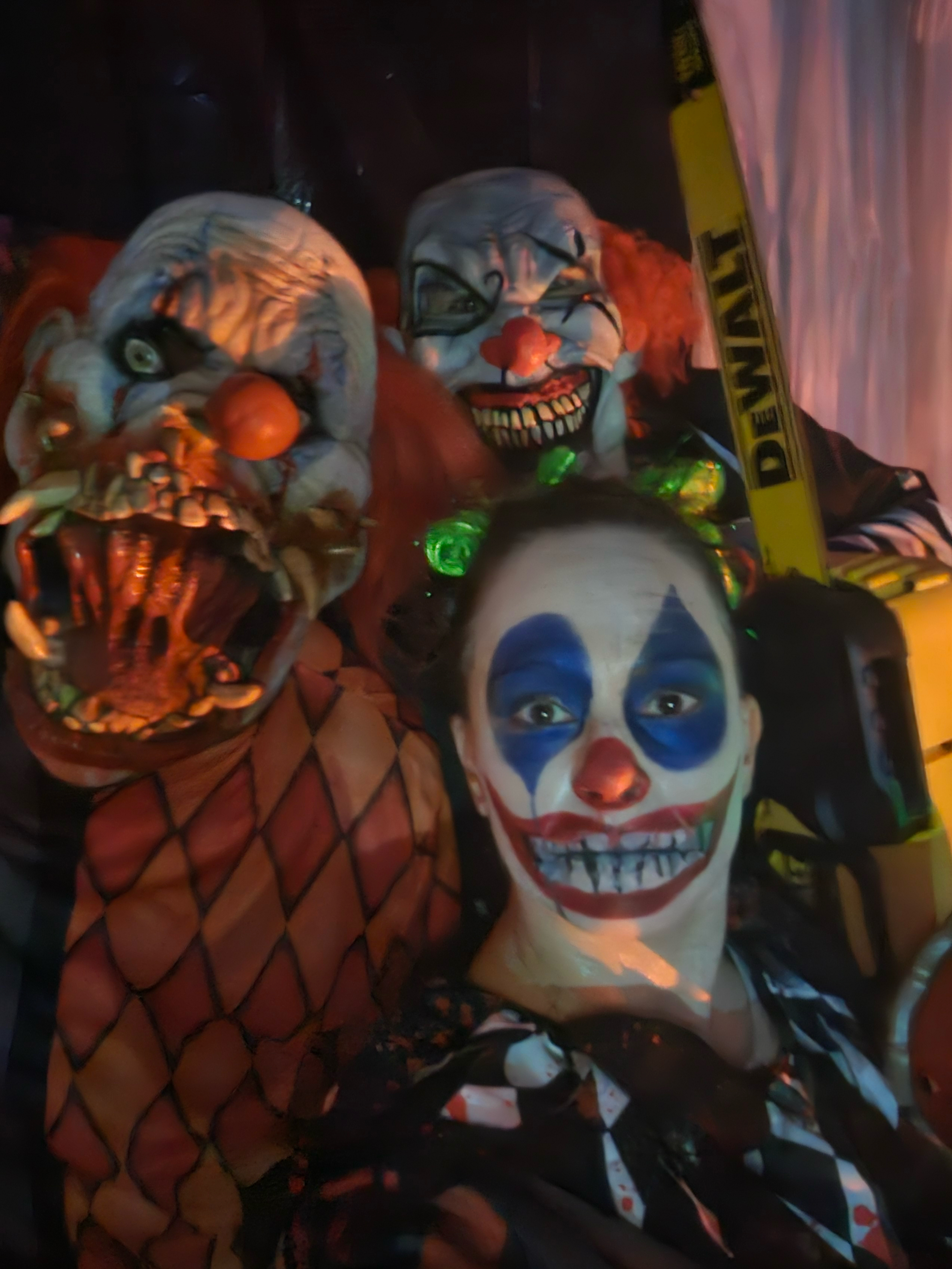 Clown characters inside the haunted house