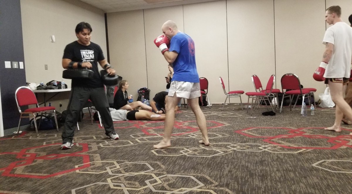 Will Deutschendorf training with a Muay Thai coach before an amateur fight.